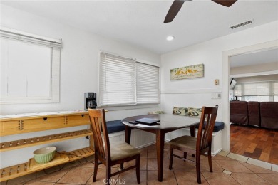 Discover this Spanish-style fixer located on a desirable corner on Mile Square Golf Course in California - for sale on GolfHomes.com, golf home, golf lot
