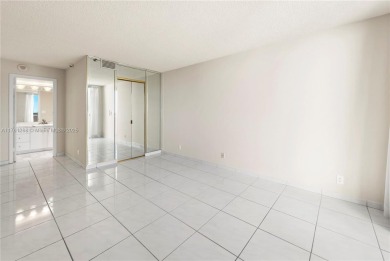 The *It* apartment with breathtaking views is for sale at a on Miami Beach Golf Club in Florida - for sale on GolfHomes.com, golf home, golf lot