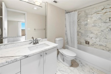 The *It* apartment with breathtaking views is for sale at a on Miami Beach Golf Club in Florida - for sale on GolfHomes.com, golf home, golf lot