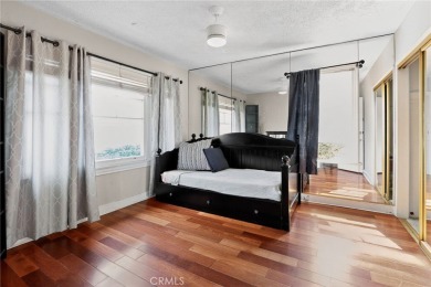 Discover this Spanish-style fixer located on a desirable corner on Mile Square Golf Course in California - for sale on GolfHomes.com, golf home, golf lot