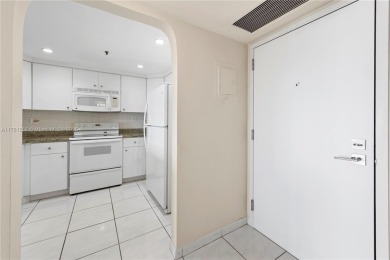 The *It* apartment with breathtaking views is for sale at a on Miami Beach Golf Club in Florida - for sale on GolfHomes.com, golf home, golf lot