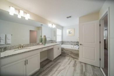 Fully furnished 5-bedroom; 5-bathroom extremely well-maintained on The Oasis Club at Champions Gate in Florida - for sale on GolfHomes.com, golf home, golf lot