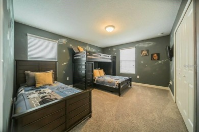 Fully furnished 5-bedroom; 5-bathroom extremely well-maintained on The Oasis Club at Champions Gate in Florida - for sale on GolfHomes.com, golf home, golf lot