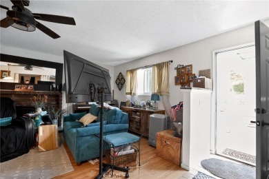 Discover this Spanish-style fixer located on a desirable corner on Mile Square Golf Course in California - for sale on GolfHomes.com, golf home, golf lot