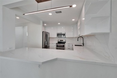 Newly remolded Patio Home with 2 bedroom 2 full bathroom with on East Lake Woodlands Country Club in Florida - for sale on GolfHomes.com, golf home, golf lot