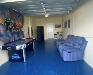 Fully furnished 5-bedroom; 5-bathroom extremely well-maintained on The Oasis Club at Champions Gate in Florida - for sale on GolfHomes.com, golf home, golf lot