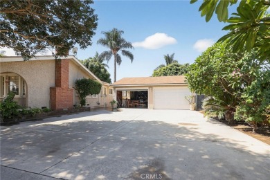 Discover this Spanish-style fixer located on a desirable corner on Mile Square Golf Course in California - for sale on GolfHomes.com, golf home, golf lot