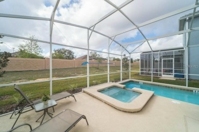 Fully furnished 5-bedroom; 5-bathroom extremely well-maintained on The Oasis Club at Champions Gate in Florida - for sale on GolfHomes.com, golf home, golf lot