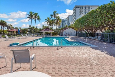 The *It* apartment with breathtaking views is for sale at a on Miami Beach Golf Club in Florida - for sale on GolfHomes.com, golf home, golf lot
