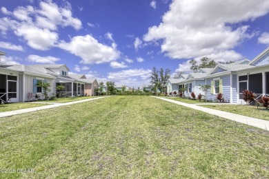 Welcome to your personal oasis in Latitude of Daytona Beach, a on LPGA International Golf Course in Florida - for sale on GolfHomes.com, golf home, golf lot