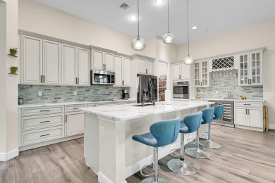 This sought-after Lago plan offers an exceptional open-concept on PGA Golf Club in PGA Village in Florida - for sale on GolfHomes.com, golf home, golf lot