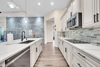 This sought-after Lago plan offers an exceptional open-concept on PGA Golf Club in PGA Village in Florida - for sale on GolfHomes.com, golf home, golf lot