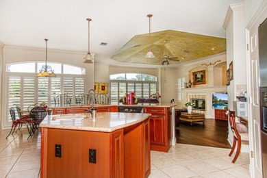 This executive 5 bedroom, 4 bathroom, 3 car garage, pool home on Wentworth Golf Club in Florida - for sale on GolfHomes.com, golf home, golf lot