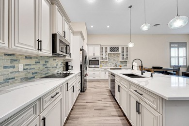 This sought-after Lago plan offers an exceptional open-concept on PGA Golf Club in PGA Village in Florida - for sale on GolfHomes.com, golf home, golf lot