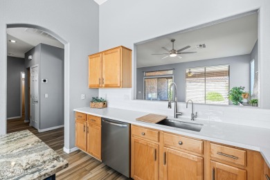 Beautifully maintained and move-in ready, this home is located on Trilogy Golf Club At Power Ranch in Arizona - for sale on GolfHomes.com, golf home, golf lot