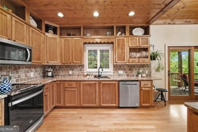 Come home to this mountain retreat located in the sought-after on The Highlands Course at Lake Arrowhead in Georgia - for sale on GolfHomes.com, golf home, golf lot