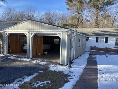 Charming well maintained 2-bedroom, 1-bathroom home on 2 acres on Hoosick Falls Country Club in New York - for sale on GolfHomes.com, golf home, golf lot