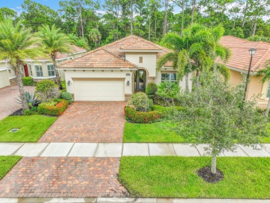This sought-after Lago plan offers an exceptional open-concept on PGA Golf Club in PGA Village in Florida - for sale on GolfHomes.com, golf home, golf lot