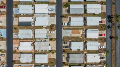 Located in Fountain View RV Resort, a well-established and on Del Tura Golf and Country Club in Florida - for sale on GolfHomes.com, golf home, golf lot