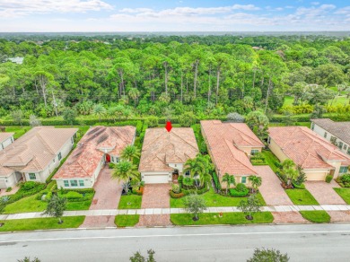 This sought-after Lago plan offers an exceptional open-concept on PGA Golf Club in PGA Village in Florida - for sale on GolfHomes.com, golf home, golf lot