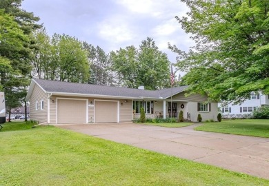 All dressed up and ready for you! Fresh paint, inside and out on Merrill Golf Club in Wisconsin - for sale on GolfHomes.com, golf home, golf lot