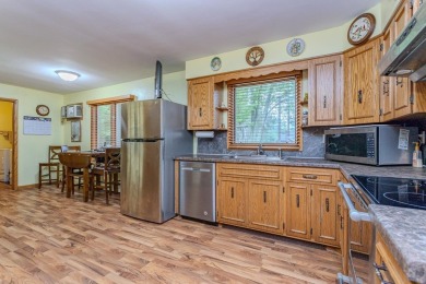 All dressed up and ready for you! Fresh paint, inside and out on Merrill Golf Club in Wisconsin - for sale on GolfHomes.com, golf home, golf lot