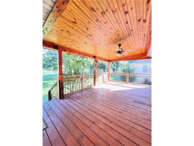 Immaculate home overlooking the beautiful 18 hole golf course on Holiday Island Golf Course in Arkansas - for sale on GolfHomes.com, golf home, golf lot