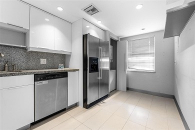 Move-in ready condo in the heart of Palm Aire featuring two en on Palm-Aire Country Club and Resort - The Oaks in Florida - for sale on GolfHomes.com, golf home, golf lot
