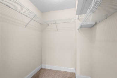 Move-in ready condo in the heart of Palm Aire featuring two en on Palm-Aire Country Club and Resort - The Oaks in Florida - for sale on GolfHomes.com, golf home, golf lot