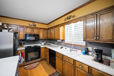 Welcome home to your beautiful golf course view retreat in on Lake Forest Yacht and Country Club in Alabama - for sale on GolfHomes.com, golf home, golf lot