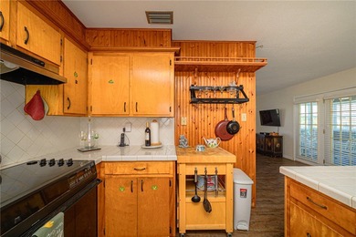 Coastal charm with Aransas Bay views in the heart of Rockport! on Rockport Country Club in Texas - for sale on GolfHomes.com, golf home, golf lot