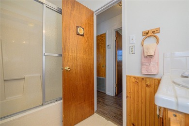 Coastal charm with Aransas Bay views in the heart of Rockport! on Rockport Country Club in Texas - for sale on GolfHomes.com, golf home, golf lot