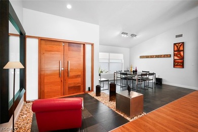 Elegant residence in the heart of Estero's coveted Wildcat Run on Wildcat Run Golf and Country Club in Florida - for sale on GolfHomes.com, golf home, golf lot