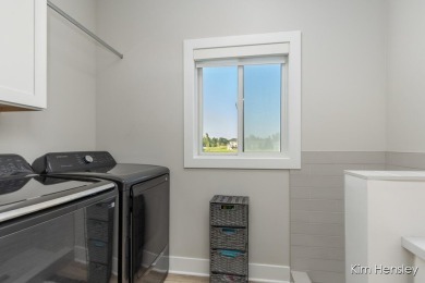 Welcome to your forever home. This immaculate modern farmhouse on The Links At Rolling Meadows in Michigan - for sale on GolfHomes.com, golf home, golf lot