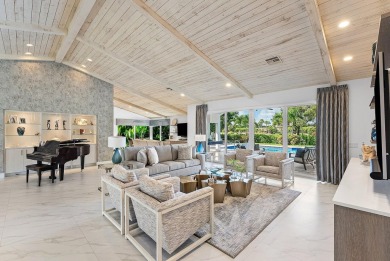 Welcome to this stunning, fully renovated contemporary residence on Bocaire Country Club in Florida - for sale on GolfHomes.com, golf home, golf lot