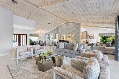 Welcome to this stunning, fully renovated contemporary residence on Bocaire Country Club in Florida - for sale on GolfHomes.com, golf home, golf lot