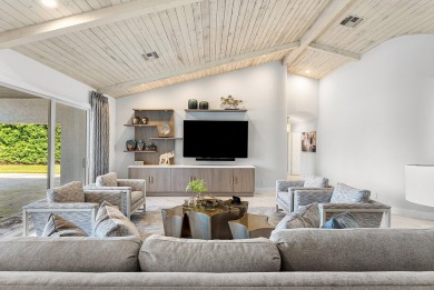 Welcome to this stunning, fully renovated contemporary residence on Bocaire Country Club in Florida - for sale on GolfHomes.com, golf home, golf lot