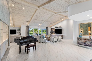 Welcome to this stunning, fully renovated contemporary residence on Bocaire Country Club in Florida - for sale on GolfHomes.com, golf home, golf lot