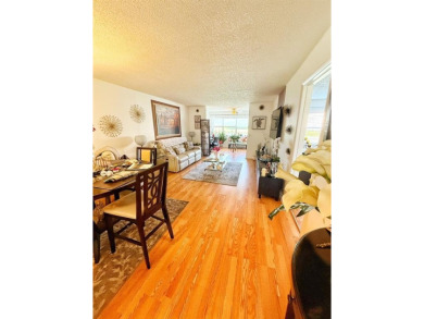 Charming Corner Garden-Style Condo Located on the first floor in on Sunrise Lakes Phase III in Florida - for sale on GolfHomes.com, golf home, golf lot