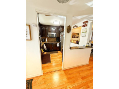 Charming Corner Garden-Style Condo Located on the first floor in on Sunrise Lakes Phase III in Florida - for sale on GolfHomes.com, golf home, golf lot
