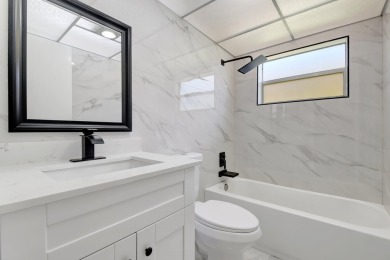 Beautifully updated first-floor unit in the sought-after Kings on Kings Point Golf - Executive in Florida - for sale on GolfHomes.com, golf home, golf lot