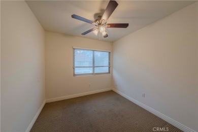 Don't miss this stunning 3-bedroom, 2.5-bath end-unit condo in on Anaheim Hills Golf Course in California - for sale on GolfHomes.com, golf home, golf lot