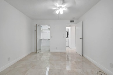 Beautifully updated first-floor unit in the sought-after Kings on Kings Point Golf - Executive in Florida - for sale on GolfHomes.com, golf home, golf lot