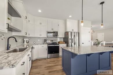 Welcome to this attractive 6-bedroom, 3-bath home located in on Teton Lakes Golf Courses in Idaho - for sale on GolfHomes.com, golf home, golf lot