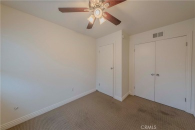 Don't miss this stunning 3-bedroom, 2.5-bath end-unit condo in on Anaheim Hills Golf Course in California - for sale on GolfHomes.com, golf home, golf lot