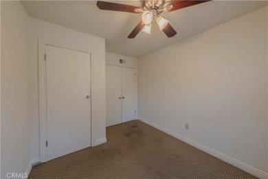 Don't miss this stunning 3-bedroom, 2.5-bath end-unit condo in on Anaheim Hills Golf Course in California - for sale on GolfHomes.com, golf home, golf lot