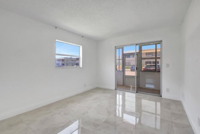 Beautifully updated first-floor unit in the sought-after Kings on Kings Point Golf - Executive in Florida - for sale on GolfHomes.com, golf home, golf lot