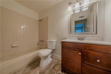 Don't miss this stunning 3-bedroom, 2.5-bath end-unit condo in on Anaheim Hills Golf Course in California - for sale on GolfHomes.com, golf home, golf lot