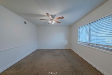 Don't miss this stunning 3-bedroom, 2.5-bath end-unit condo in on Anaheim Hills Golf Course in California - for sale on GolfHomes.com, golf home, golf lot