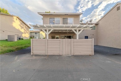 Don't miss this stunning 3-bedroom, 2.5-bath end-unit condo in on Anaheim Hills Golf Course in California - for sale on GolfHomes.com, golf home, golf lot